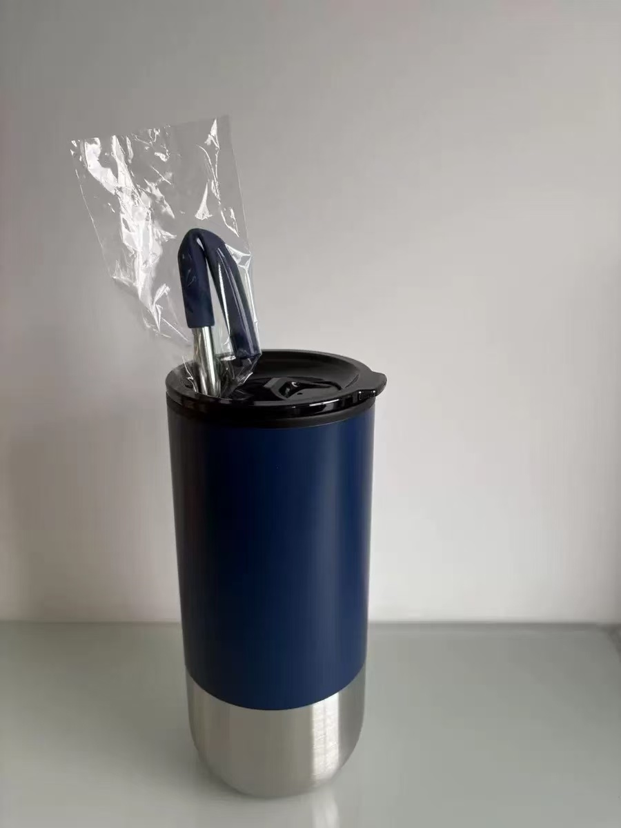 Plastic inner lining and stainless steel outer construction of coffee tumbler